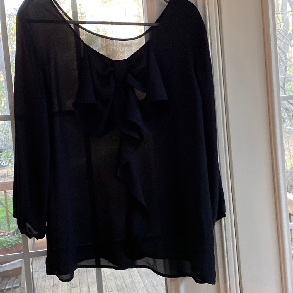 Black semi-sheer top with 3/4 sleeves and a bow in front $10 Small